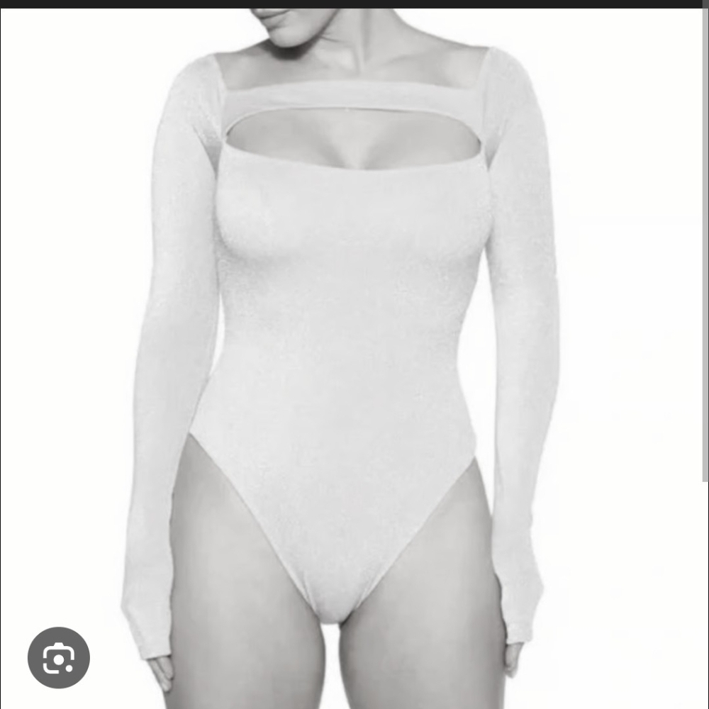 NWT Naked Wardrobe Glittering Blue Bodysuit